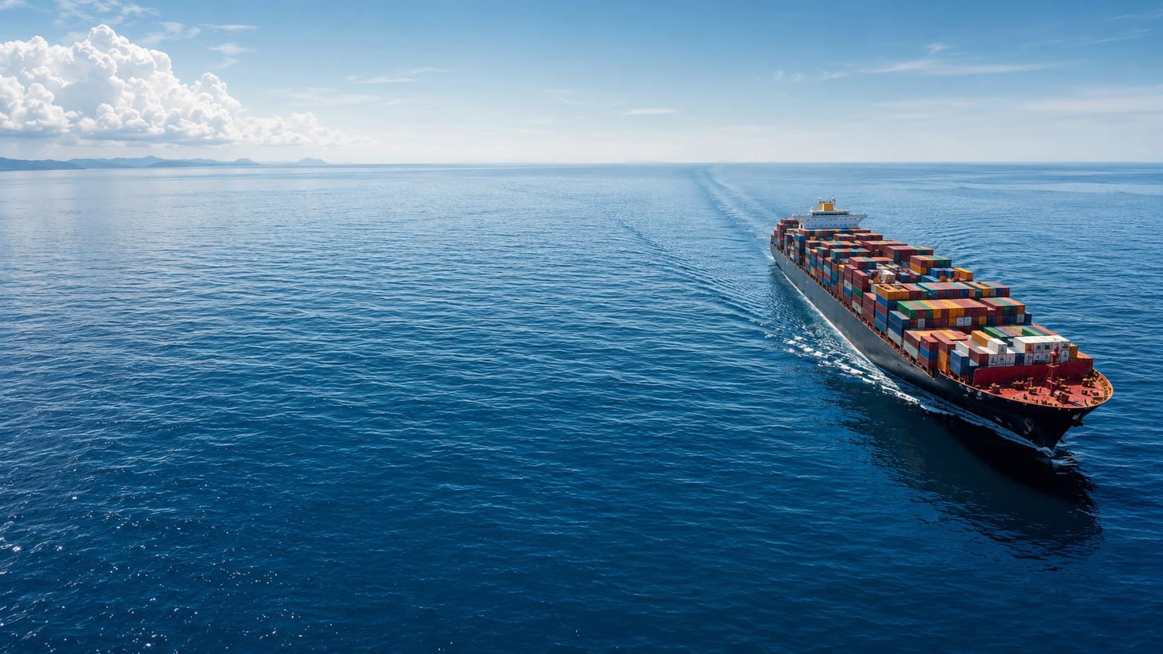 Cargo ship sailing across open water
