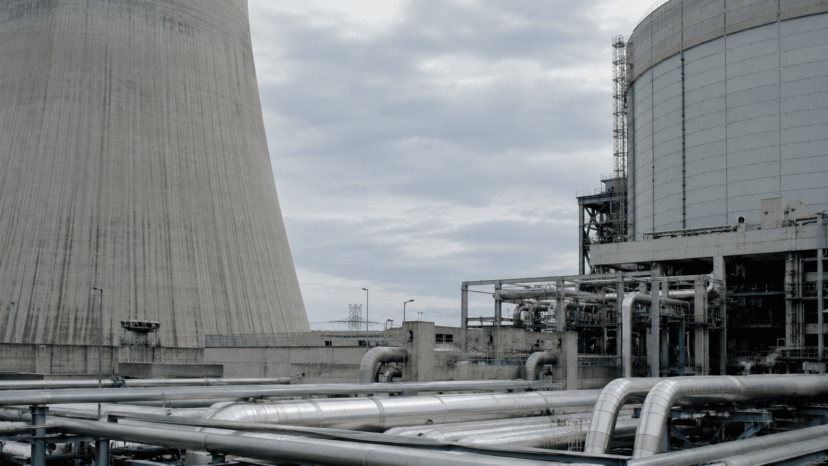 Nuclear power plant cooling towers and industrial containment structures